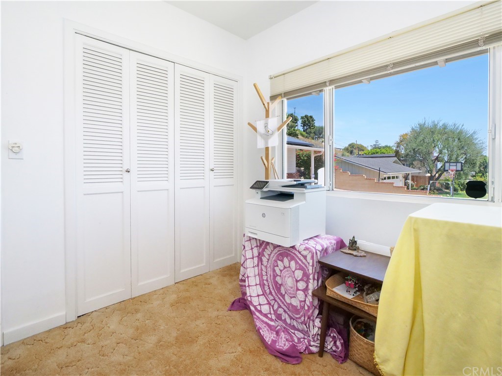 5063 Foxpoint Lane Rolling Hills Estates, CA 90274 - Photo 22 of 35 a bedroom with furniture and a window