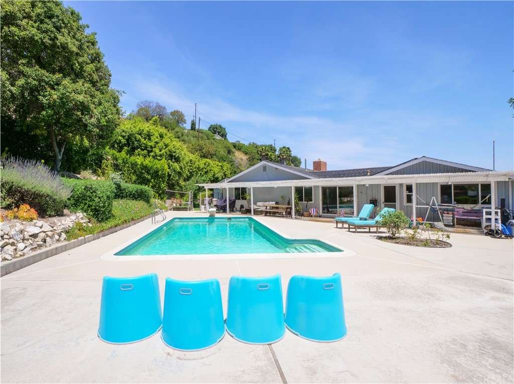5063 Foxpoint Lane Rolling Hills Estates, CA 90274 - Photo 31 of 35 a front view of a house with yard and green space