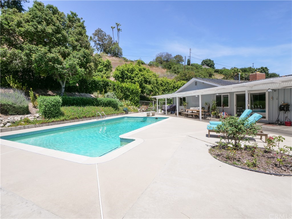 5063 Foxpoint Lane Rolling Hills Estates, CA 90274 - Photo 32 of 35 a view of a house with swimming pool and yard