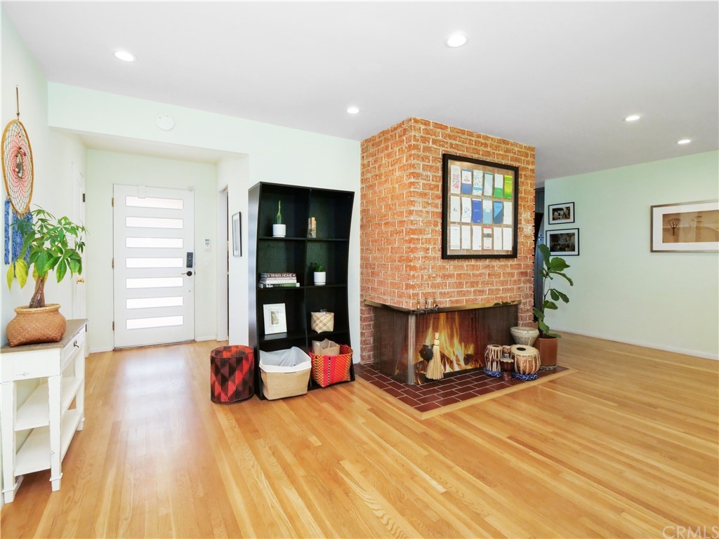 5063 Foxpoint Lane Rolling Hills Estates, CA 90274 - Photo 4 of 35 a living room with furniture and a fireplace