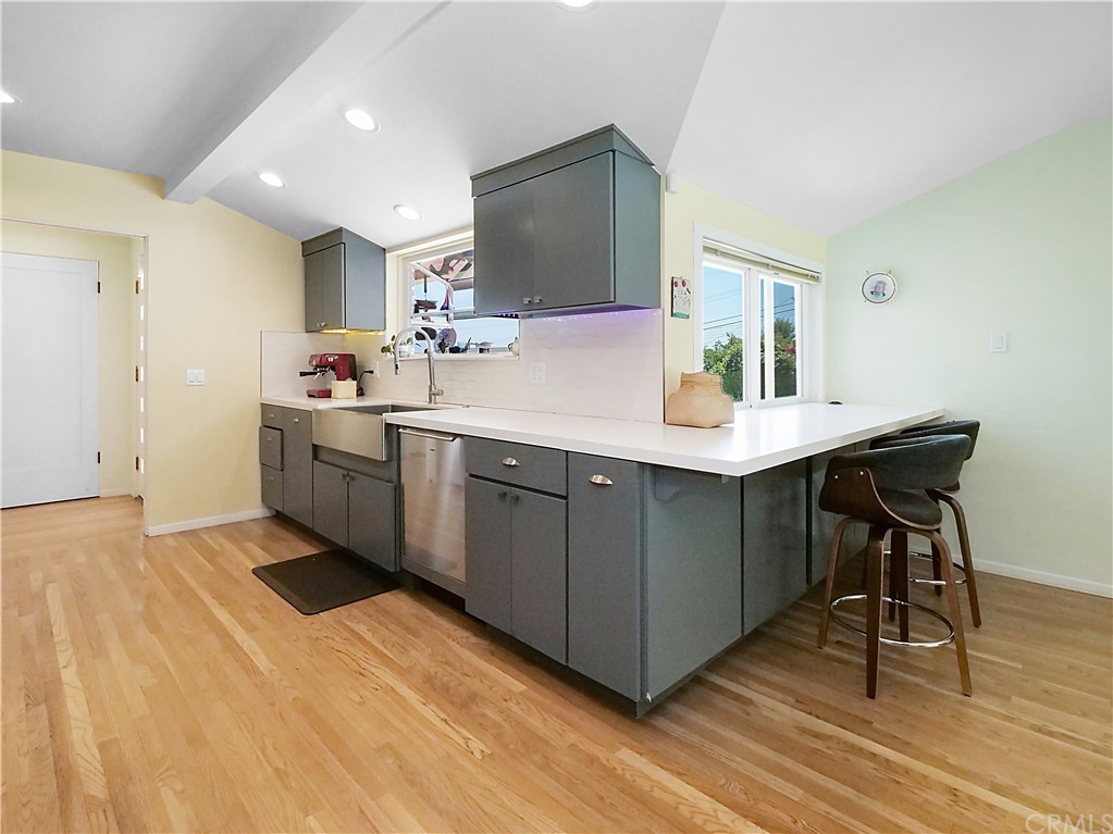 5063 Foxpoint Lane Rolling Hills Estates, CA 90274 - Photo 8 of 35 a kitchen with a sink cabinets and wooden floor