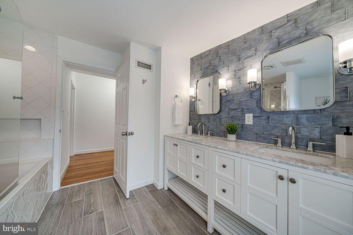 300 Highview Avenue Silver Spring, MD 20901 - Photo 20 of 47 Renovated hall bathroom sparkles!