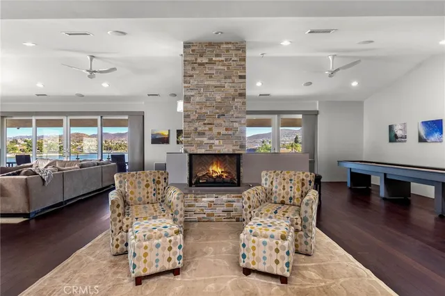 a building outdoor space with patio furniture and a potted plant