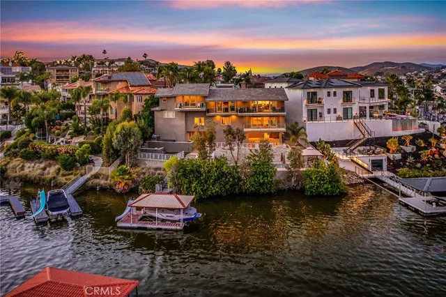 a bedroom with a large bed and a large window
