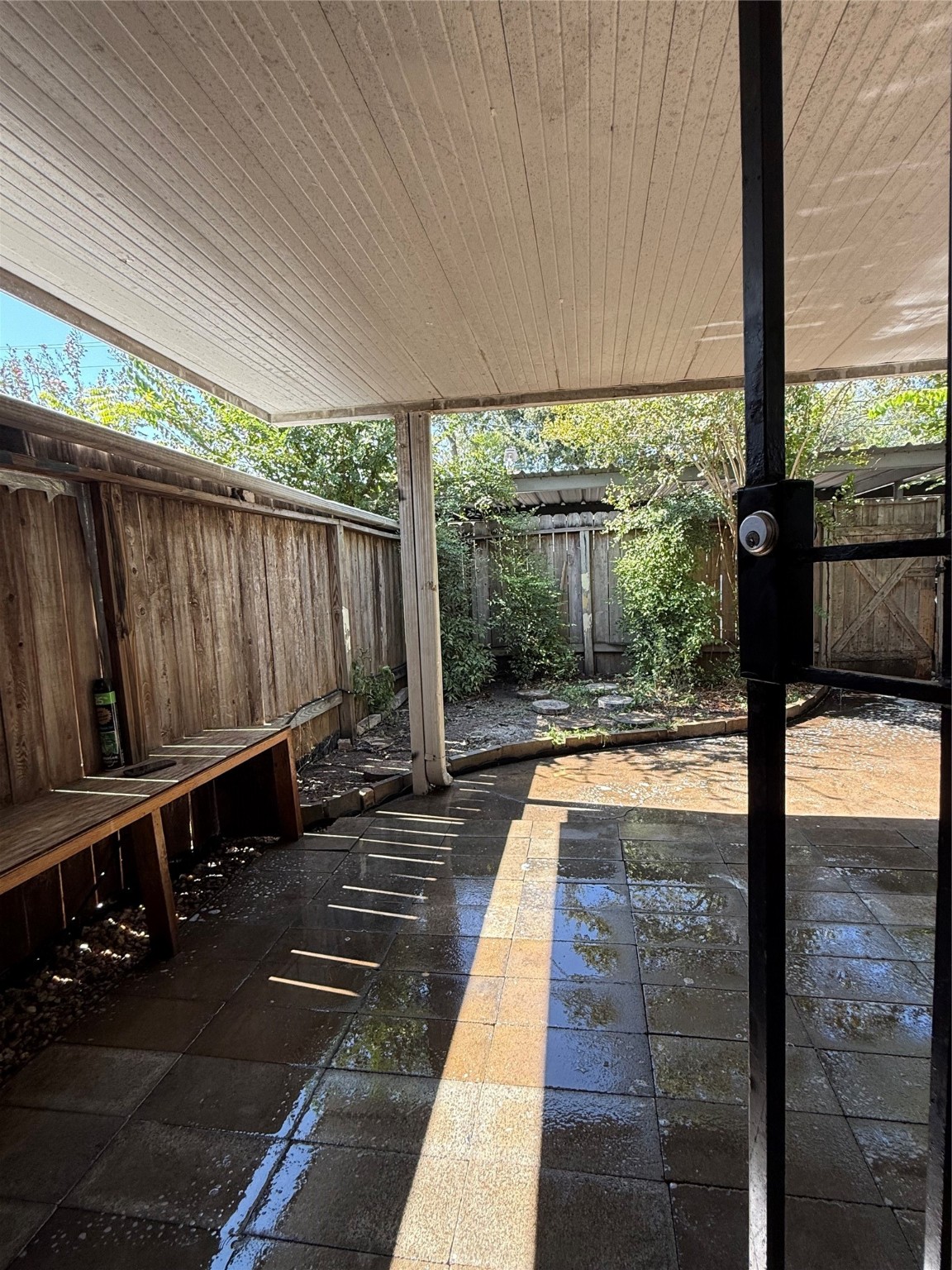 8140 Fondren Road, Unit 8140 Houston, TX 77074 - Photo 17 of 28 two-story townhouse with a mix of brick and siding exterior. It features a small front yard with a concrete path leading to the entrance. Large windows on the second floor and a neatly landscaped area enhance its curb appeal.