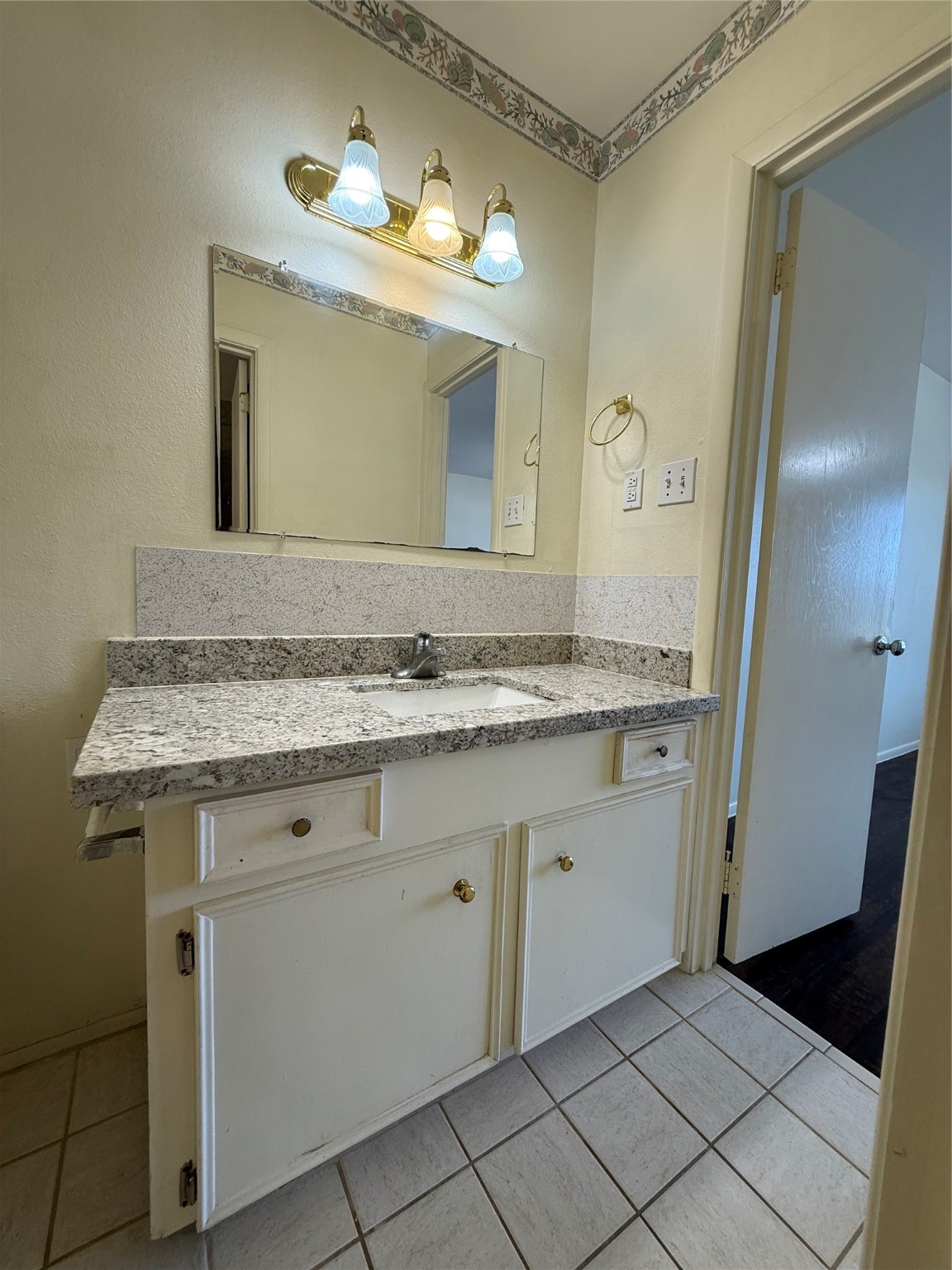 8140 Fondren Road, Unit 8140 Houston, TX 77074 - Photo 19 of 28 two-story townhouse with a mix of brick and siding exterior. It features a small front yard with a concrete path leading to the entrance. Large windows on the second floor and a neatly landscaped area enhance its curb appeal.