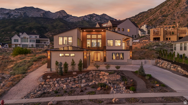 1445 Jacob Road Sandy, UT 84092 - Photo 55 of 65 Contemporary architecture featuring a multi-level design with expansive windows and a flat roofline