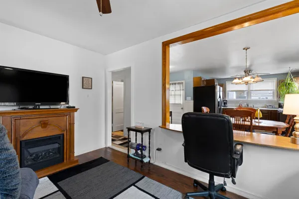 a front view of a house with a fence