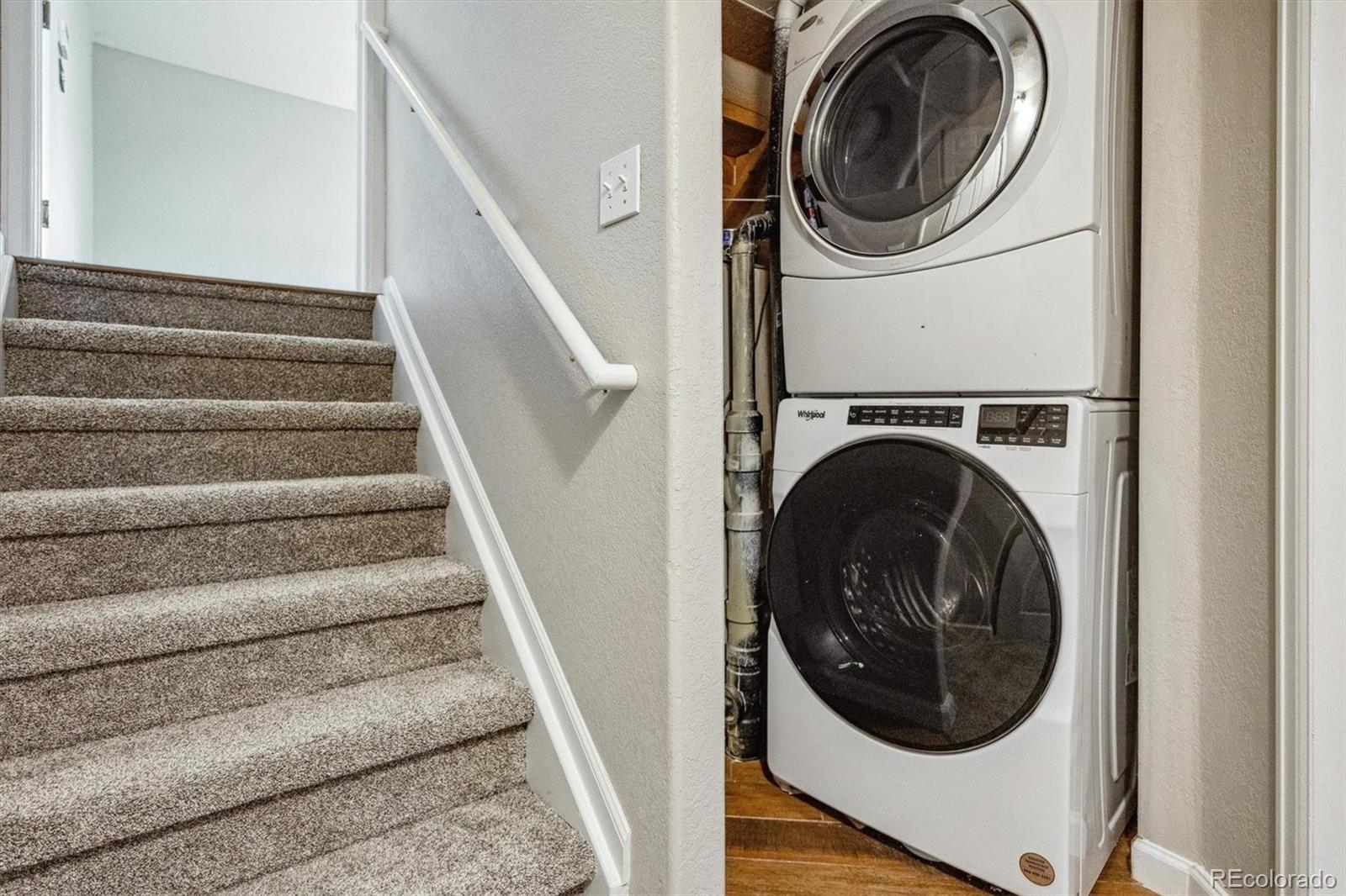 9773 Saybrook Street Highlands Ranch, CO 80126 - Photo 18 of 21 a view of entryway with washer and dryer