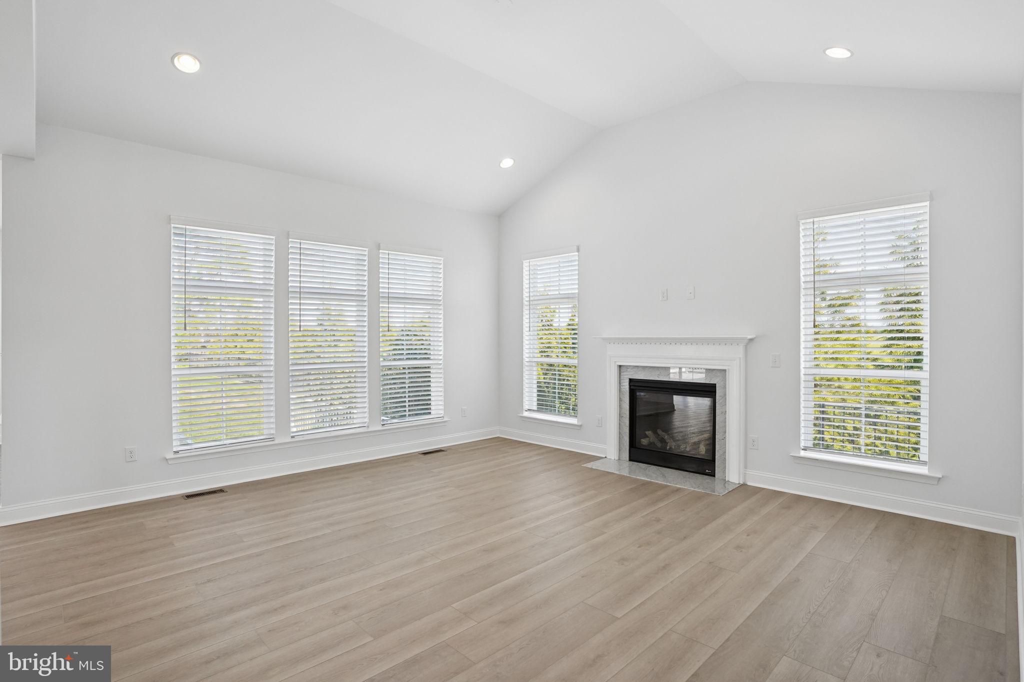 36808 Grove Estate Road Lewes, DE 19958 - Photo 16 of 47 Bright & Airy Living Area w/Fireplace.