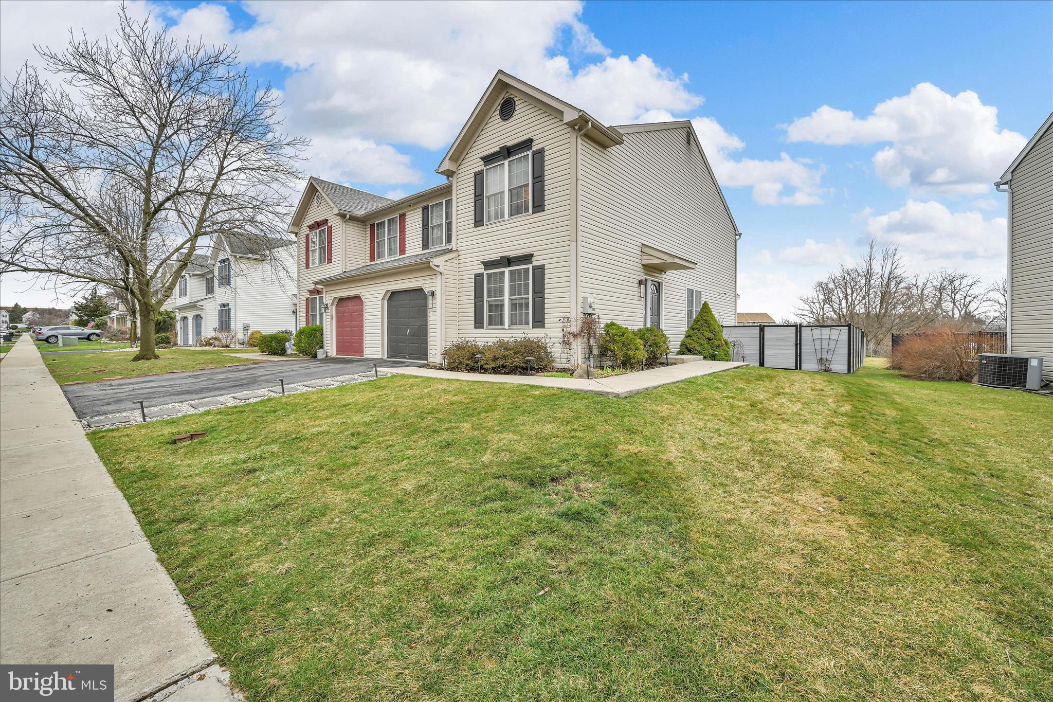 247 Bainbridge Circle Reading, PA 19608 - Photo 1 of 30 a front view of a house with a yard