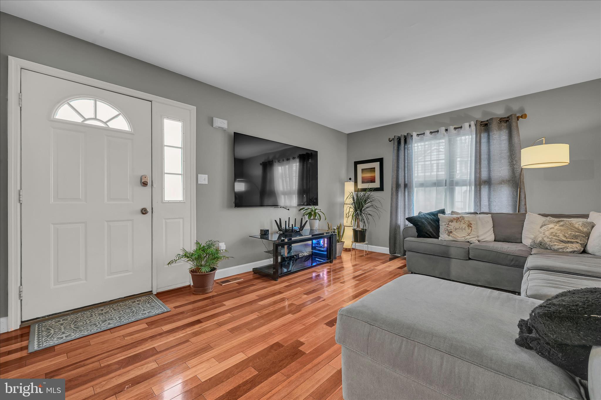 247 Bainbridge Circle Reading, PA 19608 - Photo 2 of 30 a living room with furniture and a flat screen tv