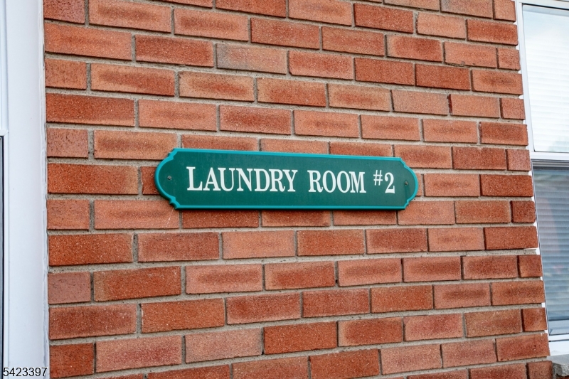 1130 Valley Road, Unit 2B Wayne, NJ 07470 - Photo 33 of 47 a sign on the wall