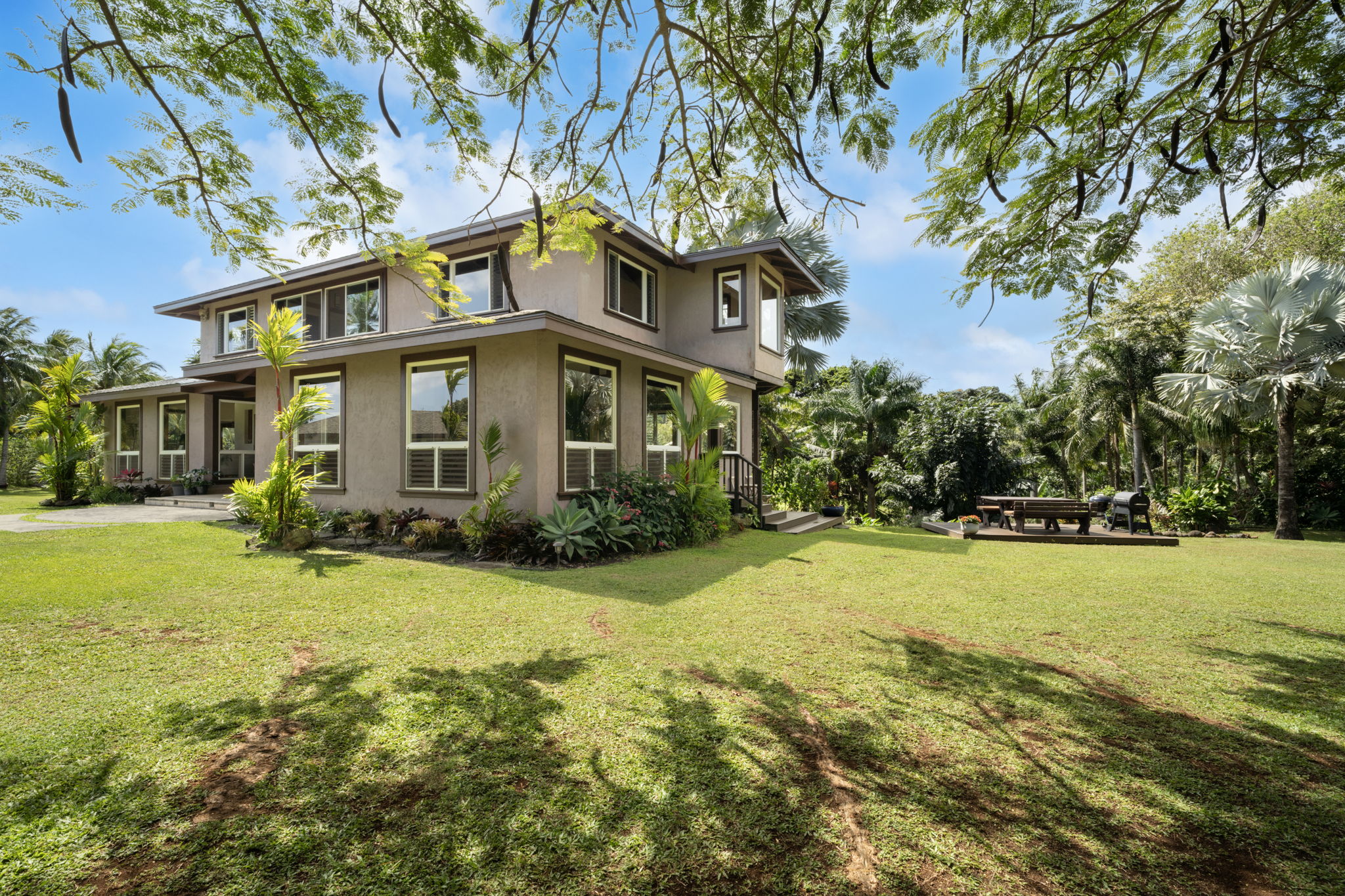 7473 E Koolau Road Kilauea, HI 96754 - Photo 1 of 30 a view of a house with a yard