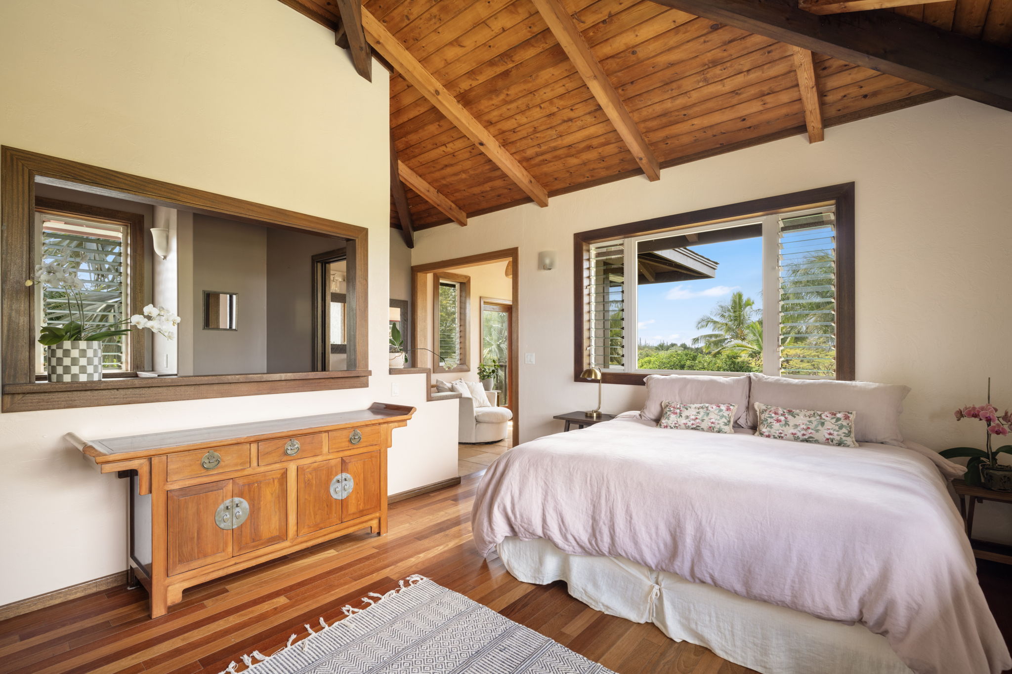 7473 E Koolau Road Kilauea, HI 96754 - Photo 14 of 30 a bed sitting in front of a window