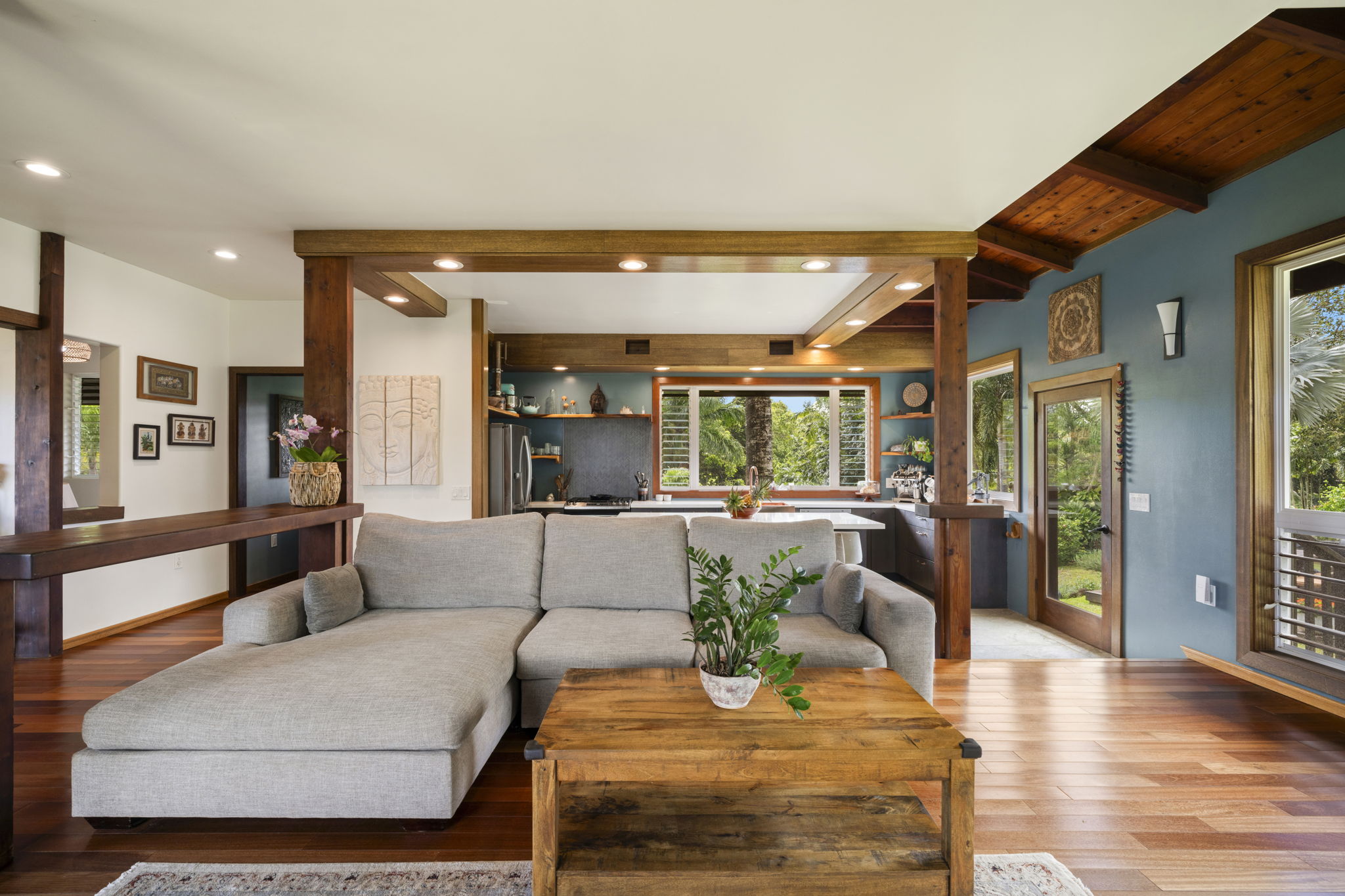 7473 E Koolau Road Kilauea, HI 96754 - Photo 6 of 30 a living room with furniture and a large window