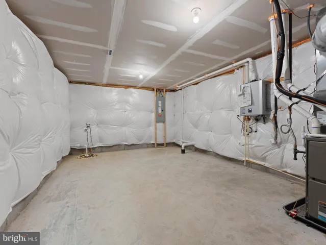 a view of a lake with houses in the back