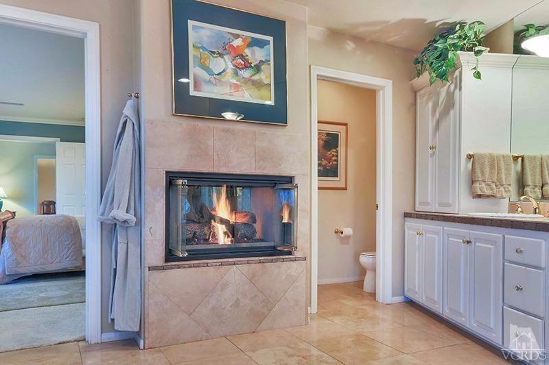 520 San Clemente Way Camarillo, CA 93010 - Photo 22 of 49 a living room with furniture and a fireplace