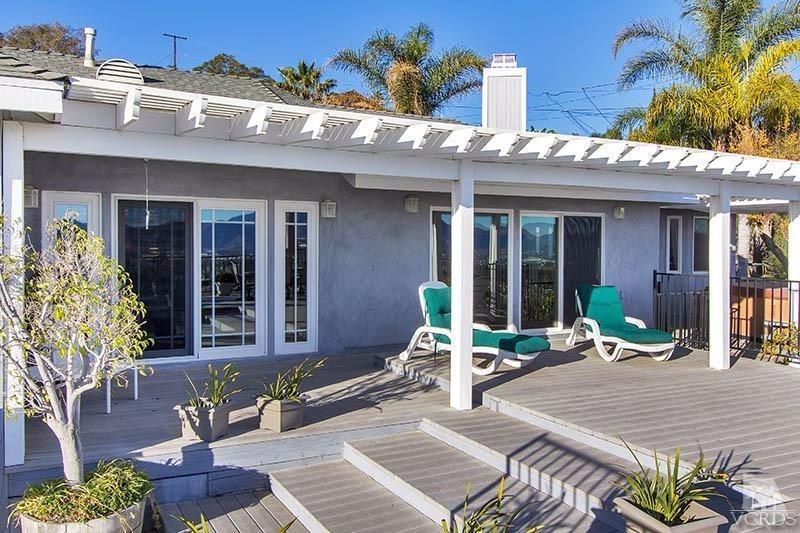 520 San Clemente Way Camarillo, CA 93010 - Photo 27 of 49 a building with potted plants in front of it