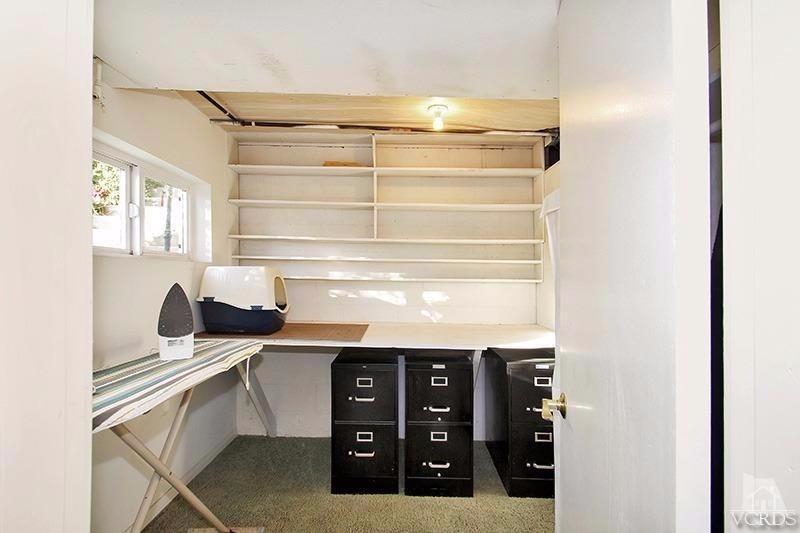 520 San Clemente Way Camarillo, CA 93010 - Photo 35 of 49 a kitchen with a sink and cabinets