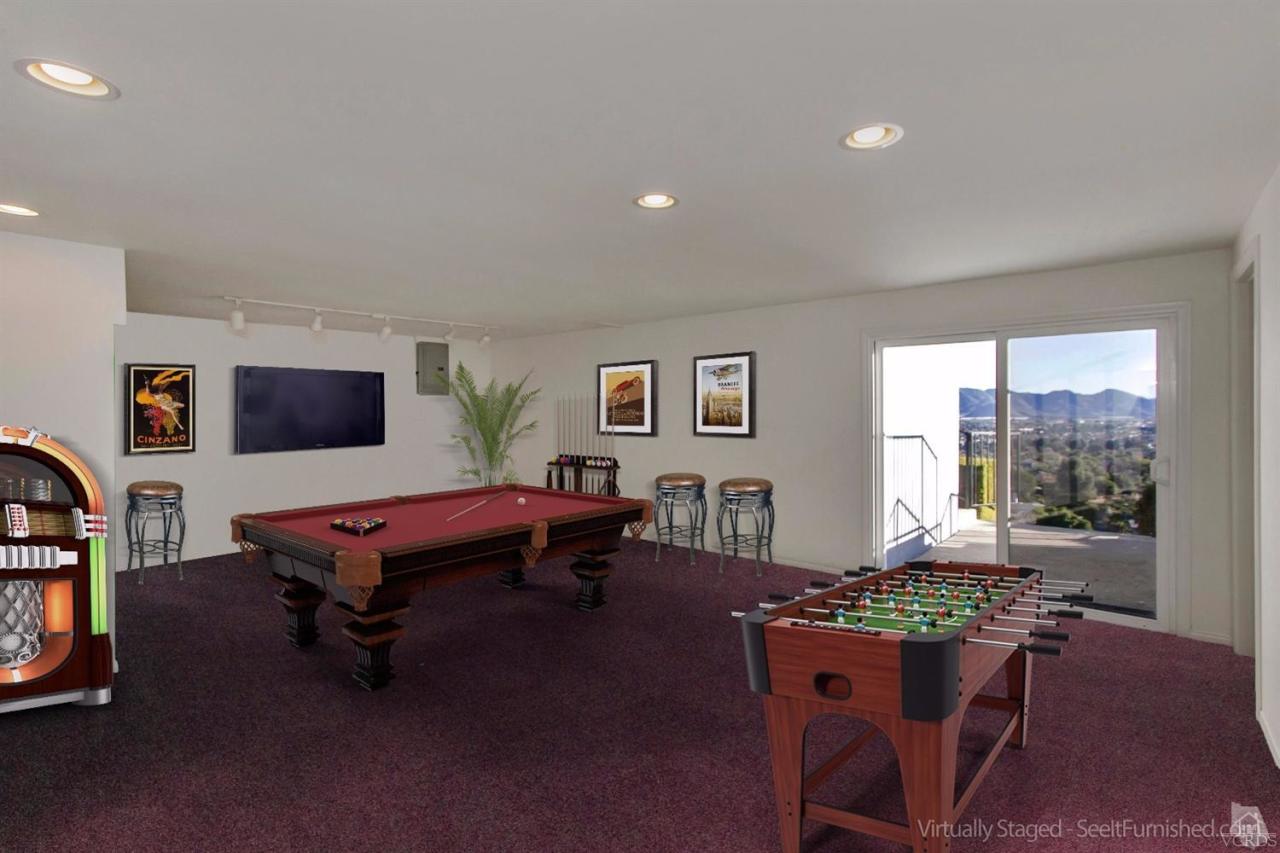520 San Clemente Way Camarillo, CA 93010 - Photo 39 of 49 a living room with furniture a window and a flat screen tv