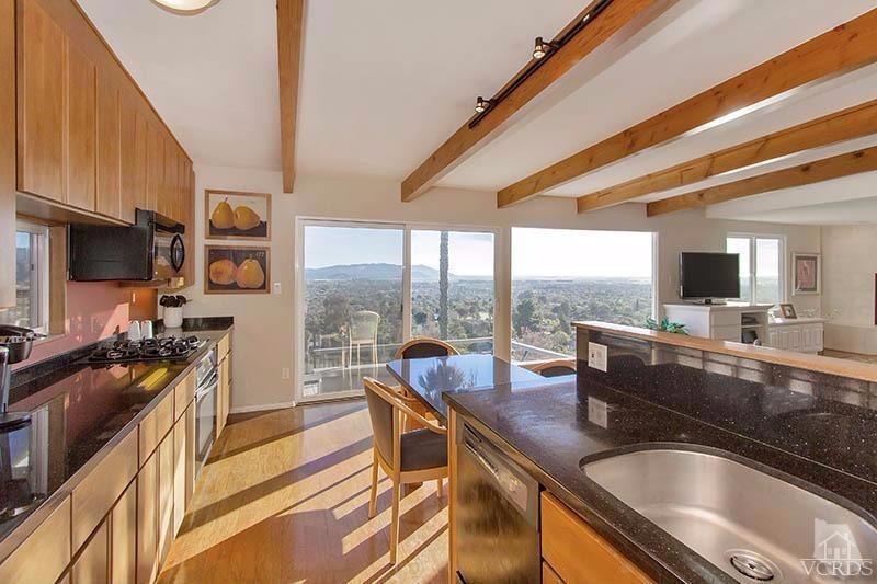 520 San Clemente Way Camarillo, CA 93010 - Photo 6 of 49 a view of a kitchen with kitchen island granite countertop lots of counter top space and stainless steel appliances