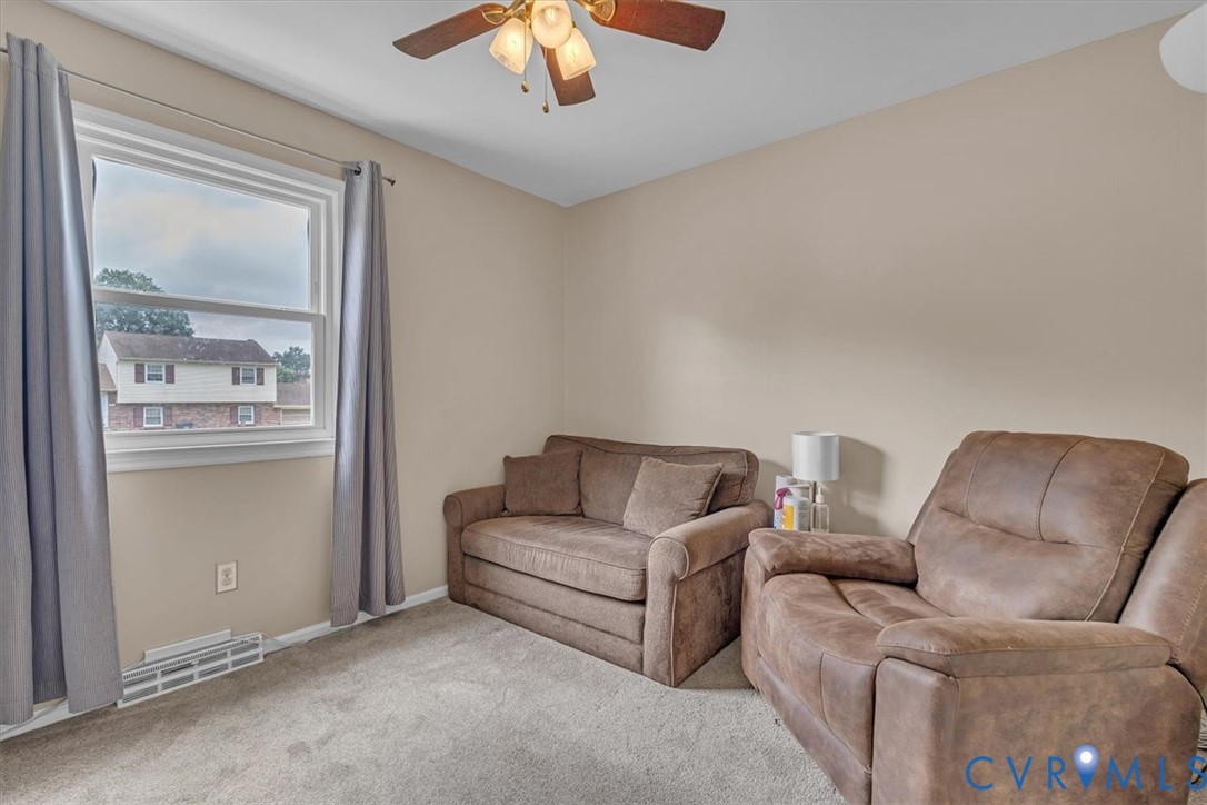 406 Windmere Drive Colonial Heights, VA 23834 - Photo 12 of 29 a living room with furniture and a window