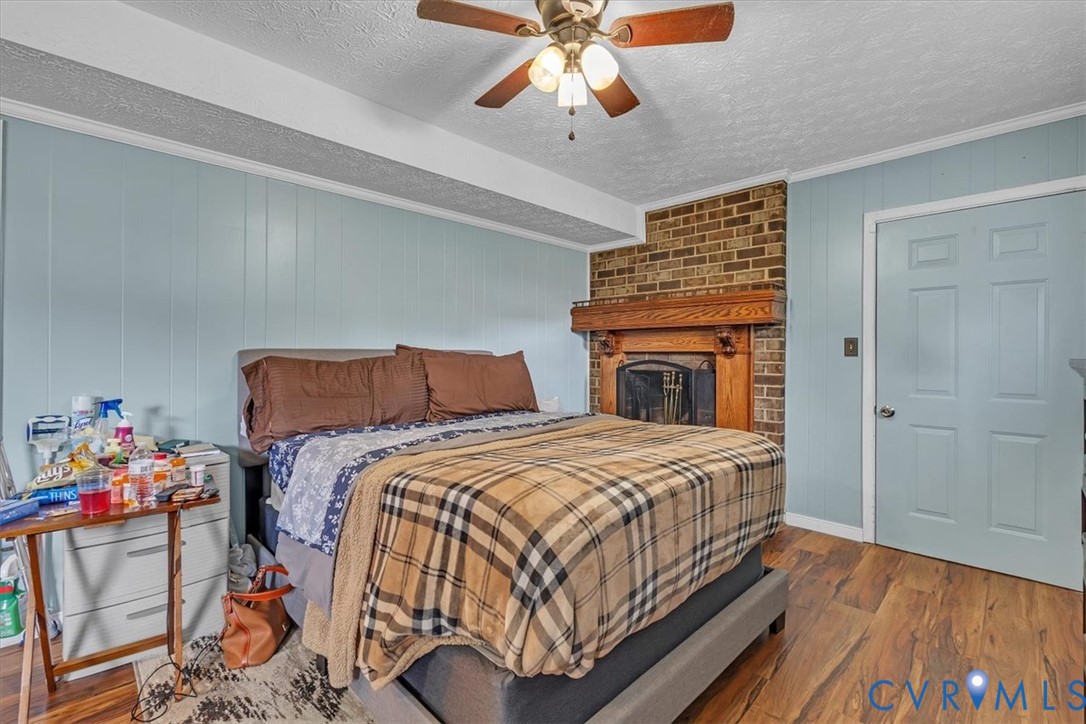 406 Windmere Drive Colonial Heights, VA 23834 - Photo 19 of 29 a bedroom with bed and wooden floor