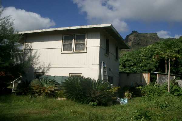 311 Kamokila Road Kapaa, HI 96746 - Photo 1 of 3 a house that has a lot of plants in it