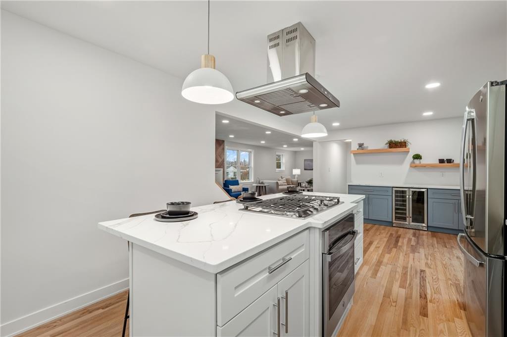 107 Marlboro Road Pittsburgh, PA 15238 - Photo 13 of 45 a kitchen with a stove a counter space a sink and appliances