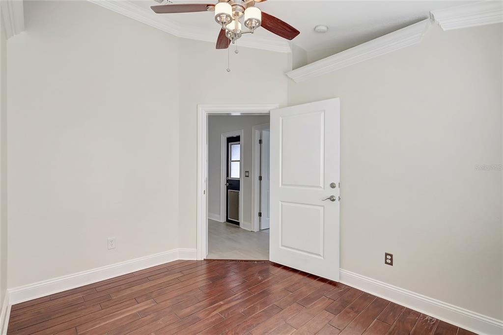 2863 Duncan Tree Circle Valrico, FL 33594 - Photo 35 of 53 a view of an empty room with wooden floor