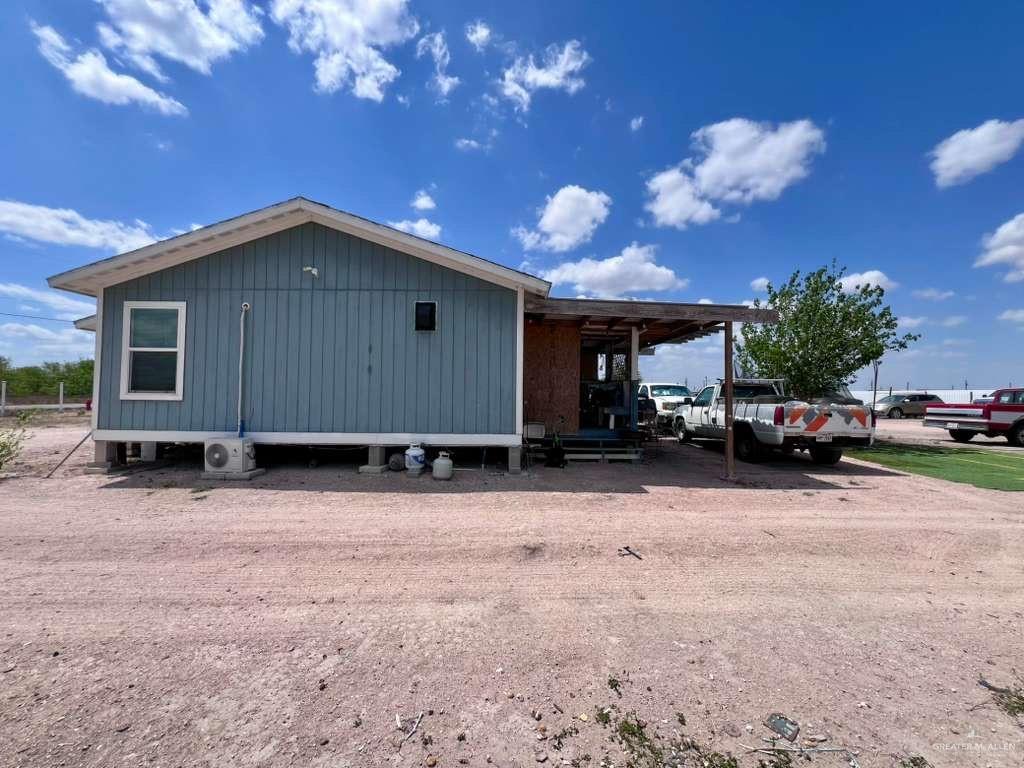 38416 El Quelite Road Penitas, TX 78576 - Photo 19 of 20 a view of a house with a yard