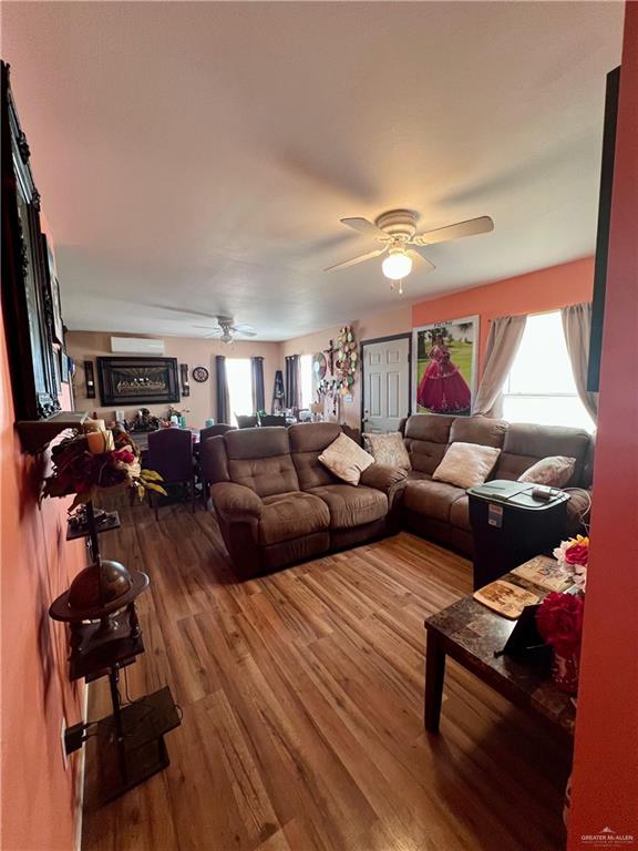 38416 El Quelite Road Penitas, TX 78576 - Photo 6 of 20 a living room with furniture and a flat screen tv