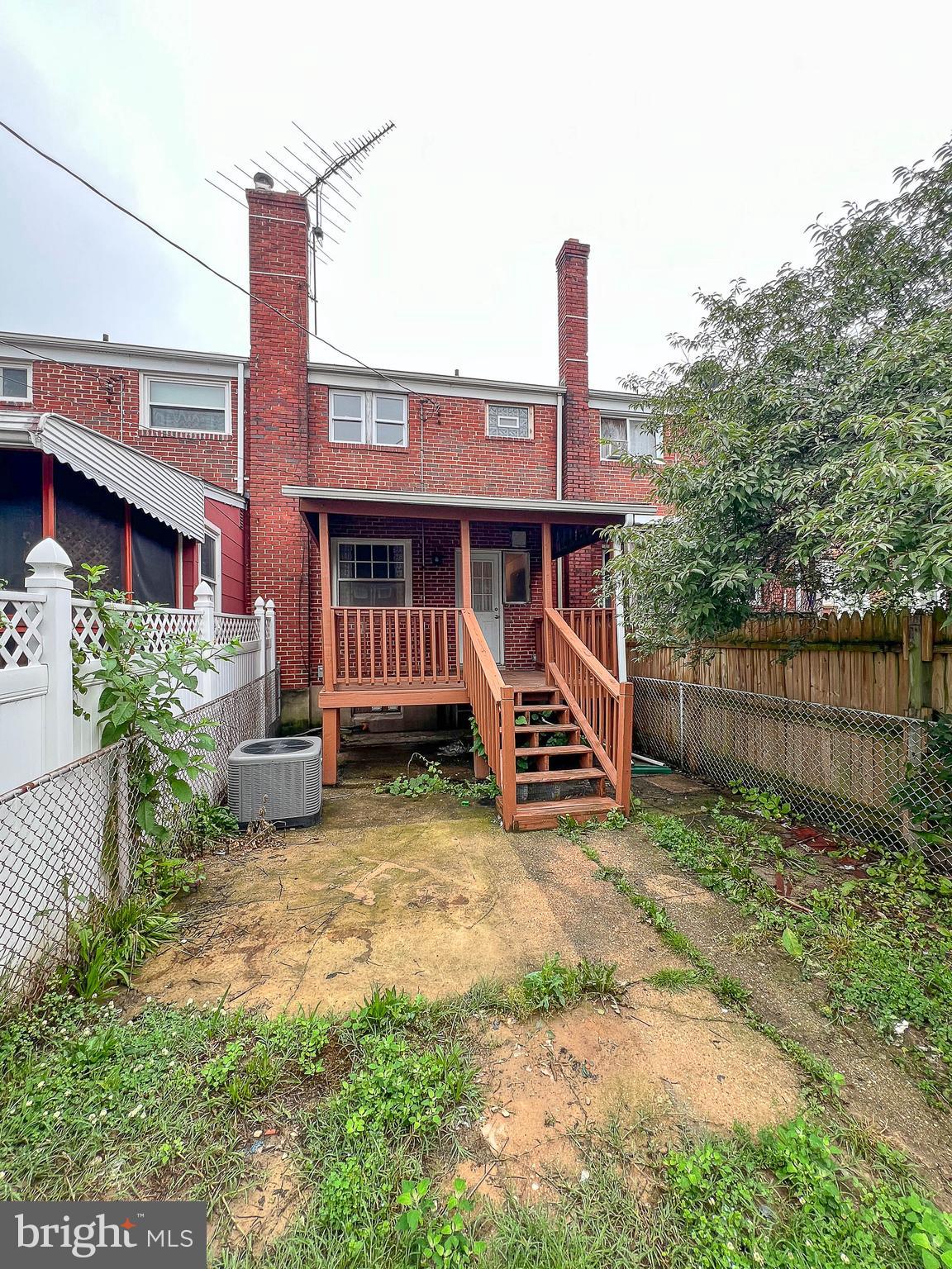 1932 Inverton Road Baltimore, MD 21222 - Photo 30 of 30 a view of a house with a yard and deck
