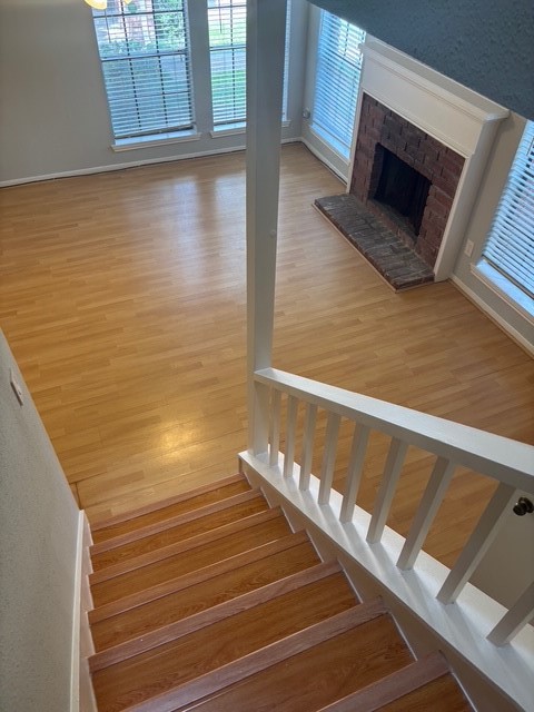 2211 South Kirkwood Road, Unit 22 Houston, TX 77077 - Photo 7 of 15 a view of wooden floor with staircase