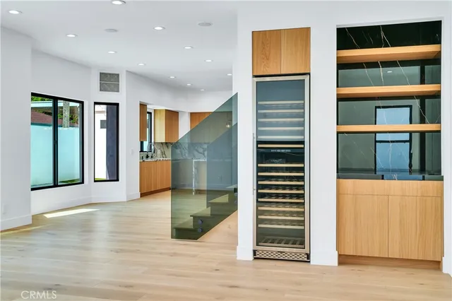 a view of an entryway door with wooden floor