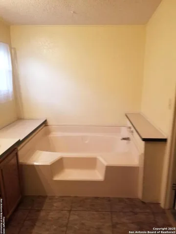 a bathroom with a toilet and a sink