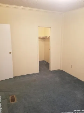 a bathroom with a shower and a toilet