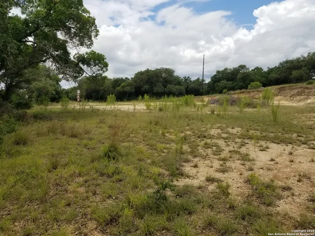 a view of lake with green space