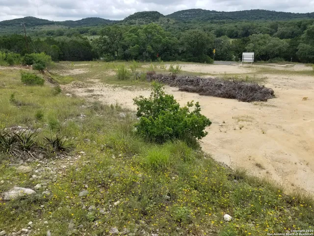 a view of lake with green space