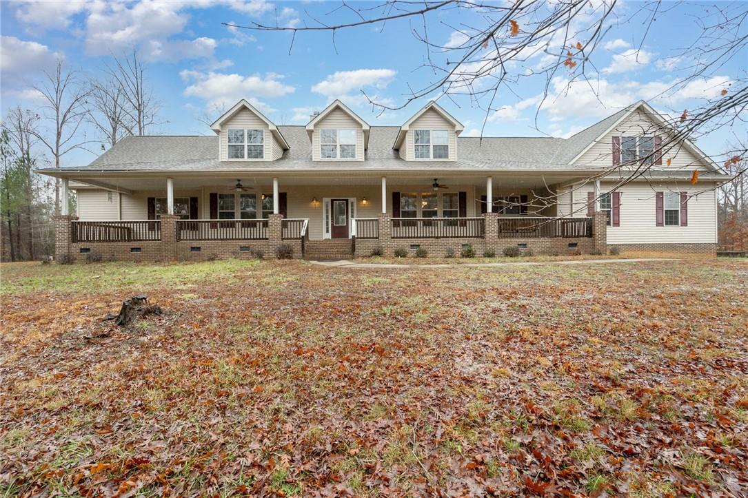 4793 Logging Road Lancaster, SC 29720 - Photo 8 of 32 a view of a big house with a big yard and large trees
