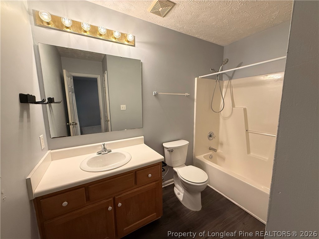 231 Bahia Lane Raeford, NC 28376 - Photo 7 of 10 a bathroom with a sink toilet and shower