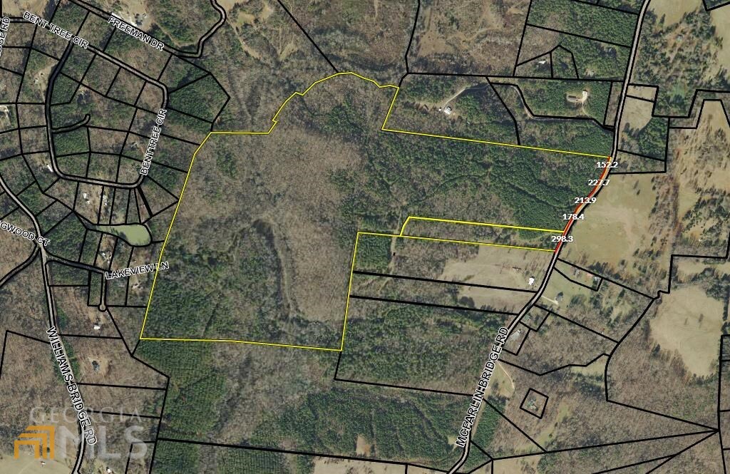 0 Mcfarlin Bridge Road Carnesville, GA 30521 - Photo 1 of 1 an aerial view of residential houses with outdoor space