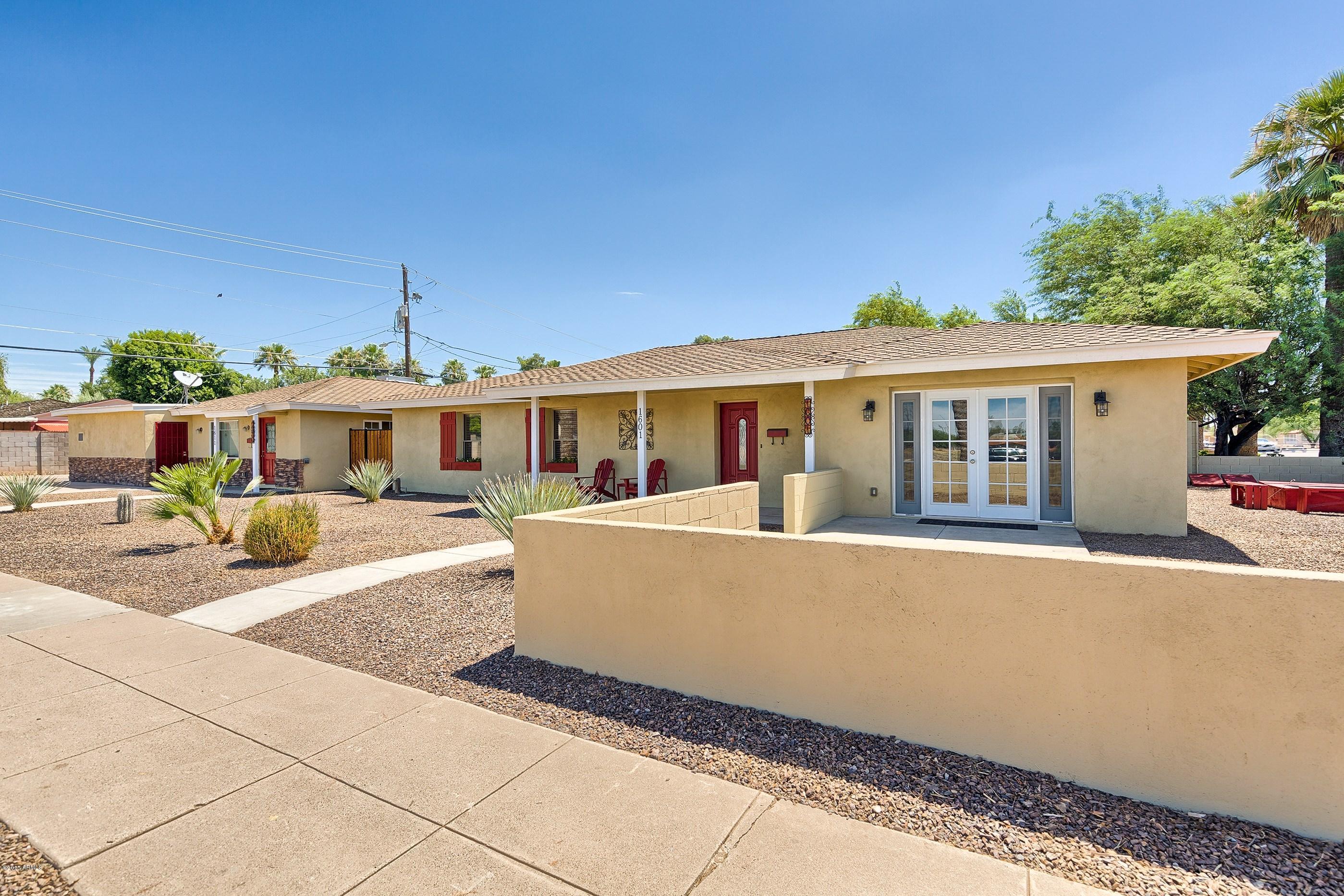 1601 North 13th Avenue Phoenix, AZ 85007 - Photo 2 of 18 a view of a house with backyard and sitting area
