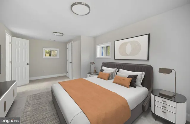 a bedroom with bed and window