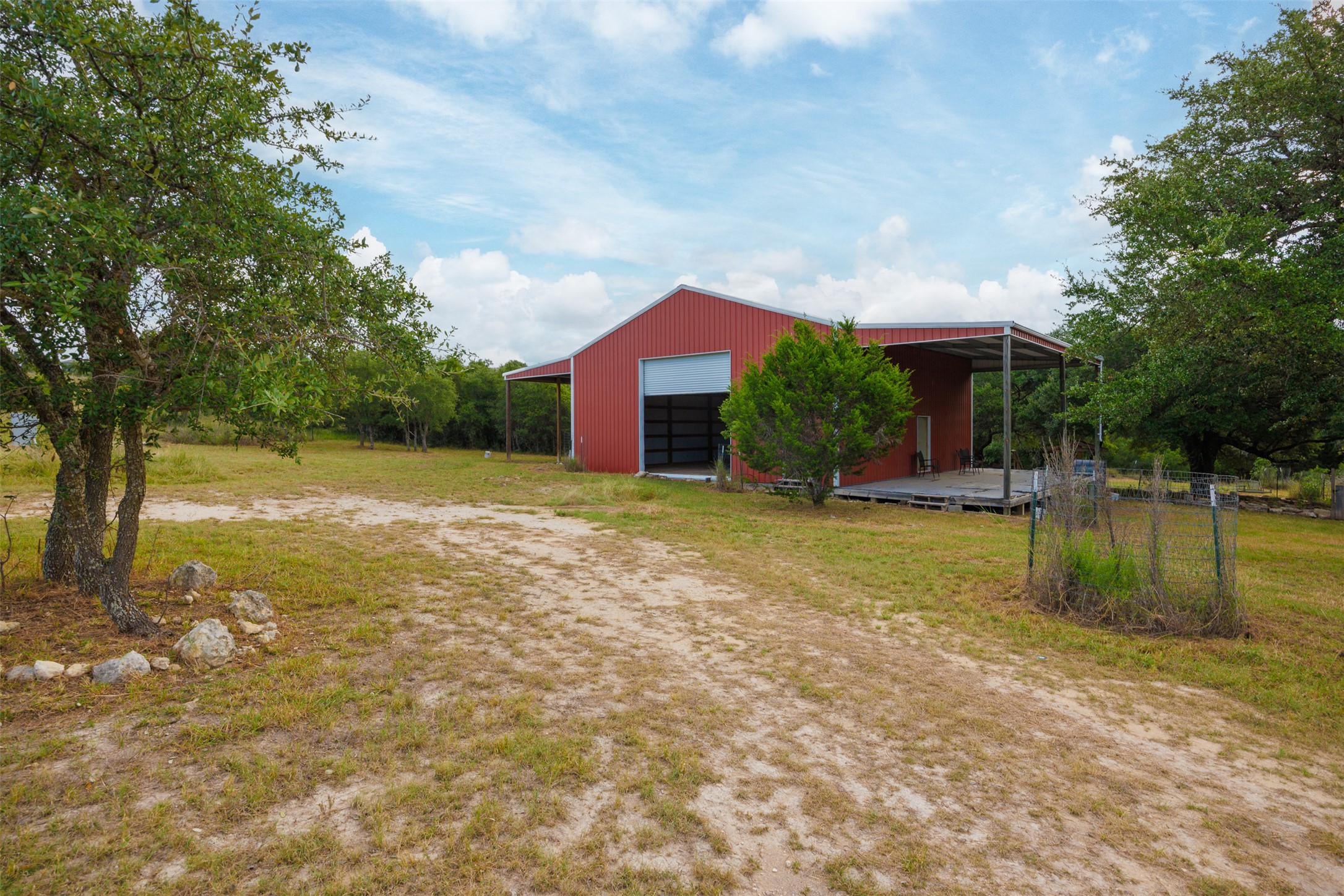428 Summit Spring Lane Johnson City, TX 78636 - Photo 13 of 19 a view of a house with pool yard and a yard