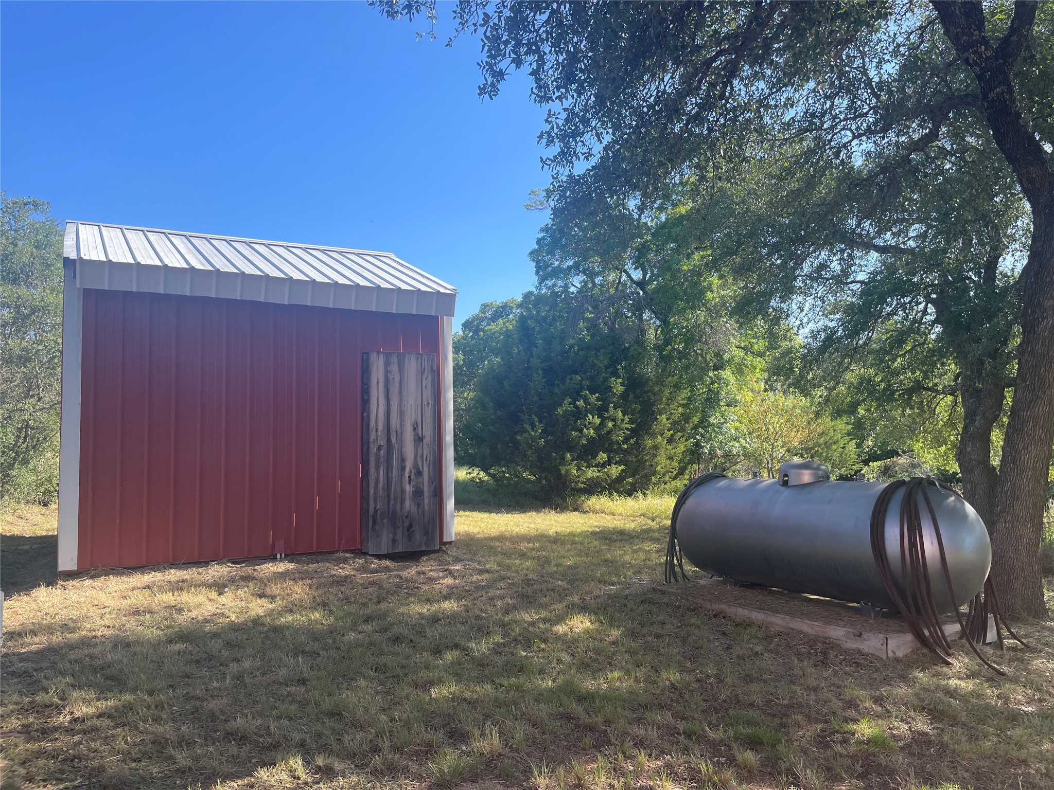 428 Summit Spring Lane Johnson City, TX 78636 - Photo 5 of 19 a view of backyard with jacuzzi