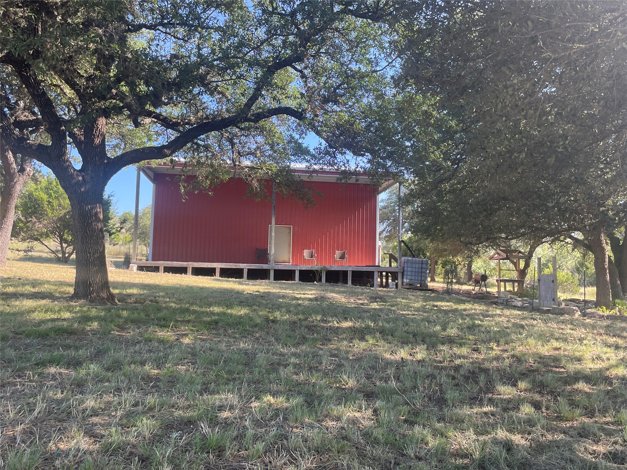 428 Summit Spring Lane Johnson City, TX 78636 - Photo 7 of 19 a fire hydrant in the middle of a field