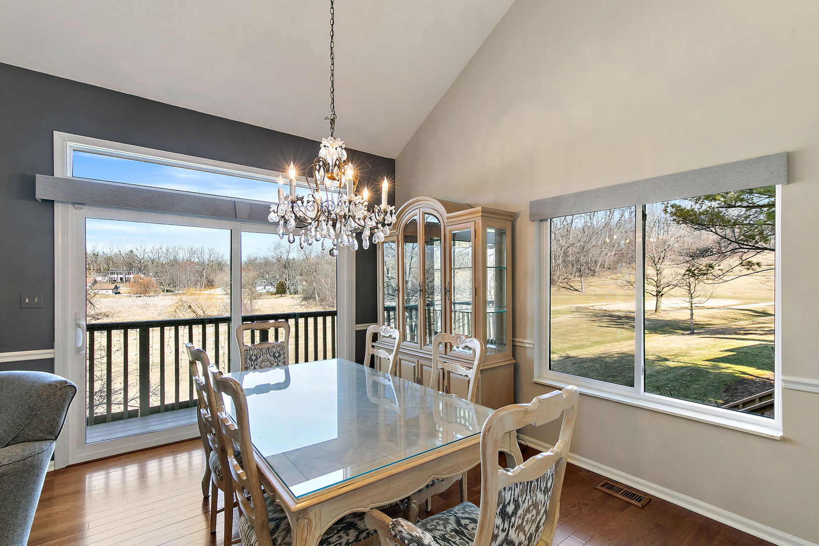 814 Oak Hill Road Lake Barrington, IL 60010 - Photo 11 of 59 a view of a dining room with furniture a chandelier and wooden floor