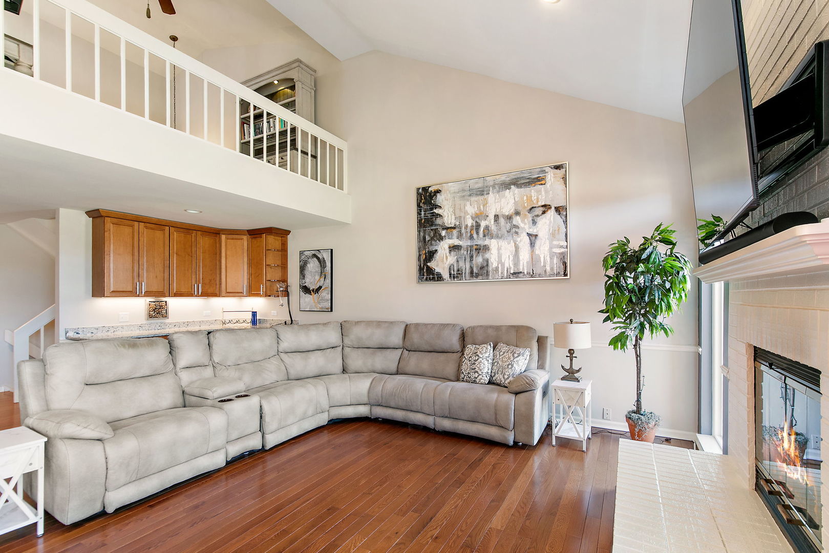 814 Oak Hill Road Lake Barrington, IL 60010 - Photo 13 of 59 a living room with furniture and a fireplace